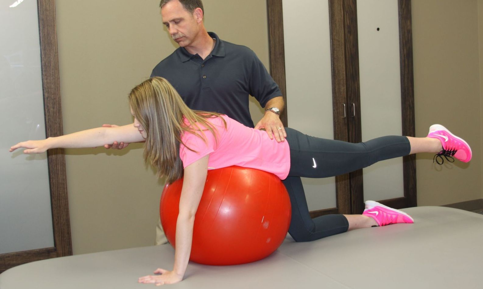girl in spine therapy